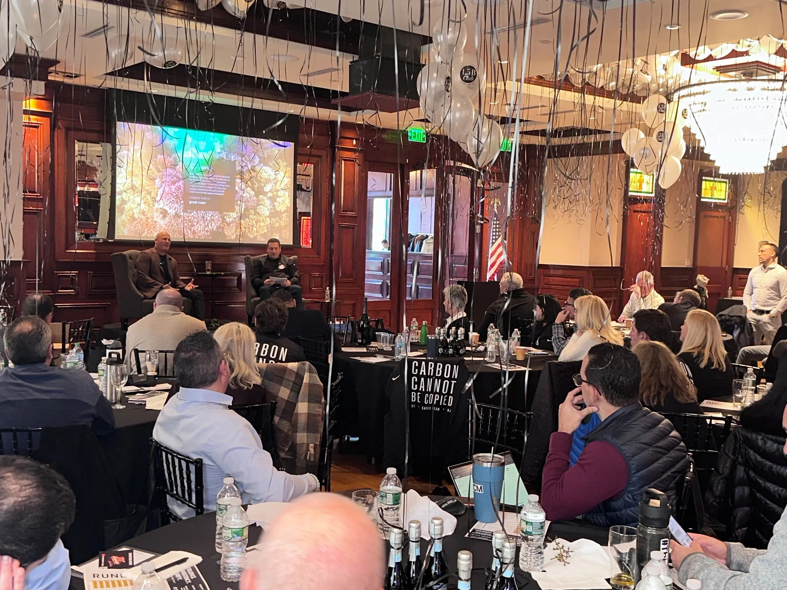 Audience attending a business presentation event.